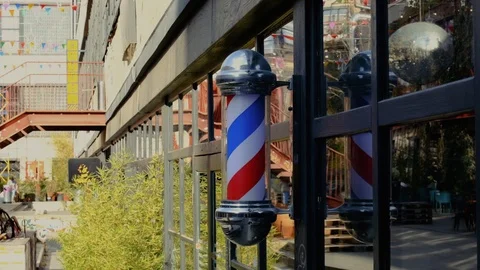 Spinning blue white and red symbol of the barber shop Stock Footage 123402650