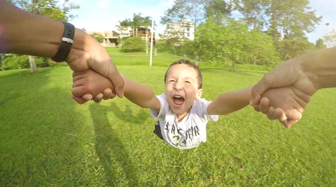Spinning boy turning son rotating child father rotating child Stock Footage 51228318