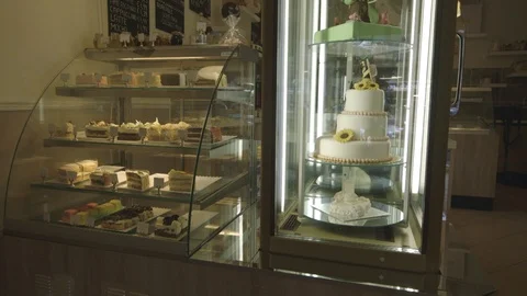 Spinning Cake in a cake shop Stock Footage 92129116
