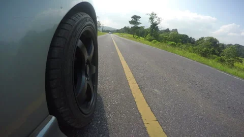 Spinning car wheel Stock Footage 284975160