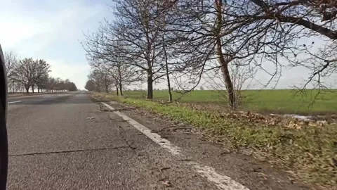 Spinning car wheel in motion Stock Footage 147668897