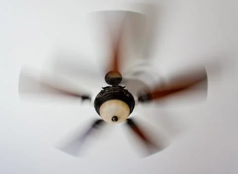 Spinning ceiling fan Stock Photos