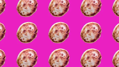 Spinning cheese pancakes pattern Stock Footage 103331462