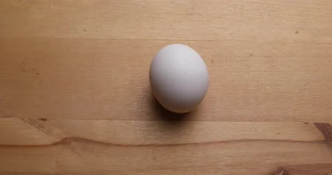 Spinning chicken egg Stock Footage 156859141