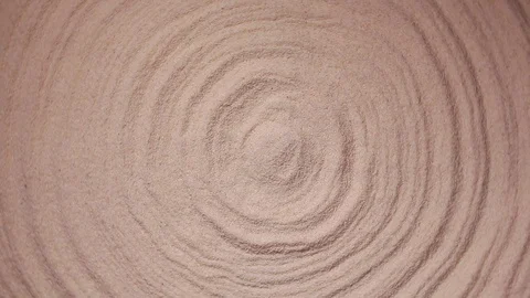Spinning circles in the sand Stock Footage 103508030