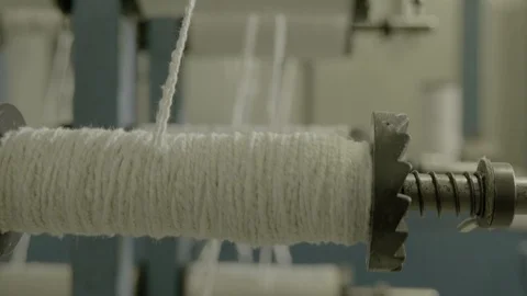Spinning clews with threads on a rack at a textile plant. Stock Footage 126292344