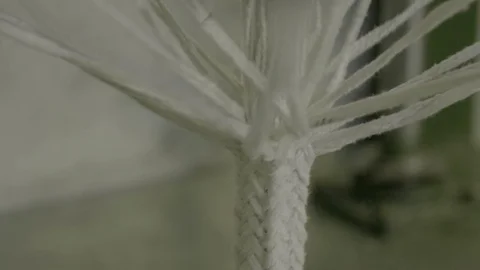 Spinning clews with threads on a rack at a textile plant. Stock Footage 127250795
