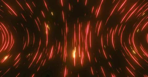 Spinning cluster of orange-red light streaks forming radial pattern in dark 스톡 사진