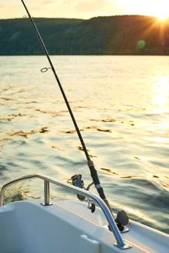 Spinning with the coil on the background of the river Stock Photos