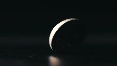 A spinning coin Stock Footage 234192602