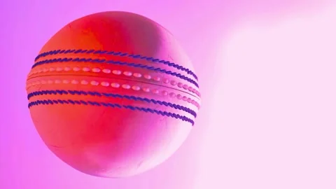 Spinning cricket ball rotating on pink background in cinematic motion Stock-Footage 341802092