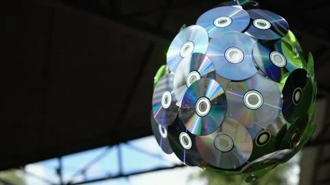 Spinning disco ball is made from CD compact disc outdoor. Stock Footage 318370037