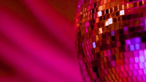 Spinning disco ball with pink light reflections in professional night club Stock-Footage 341970329
