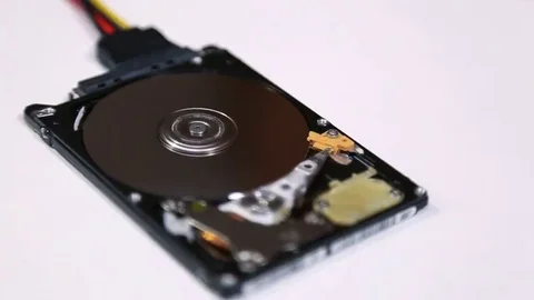 Spinning disk computer hard drive Stock Footage 69084083