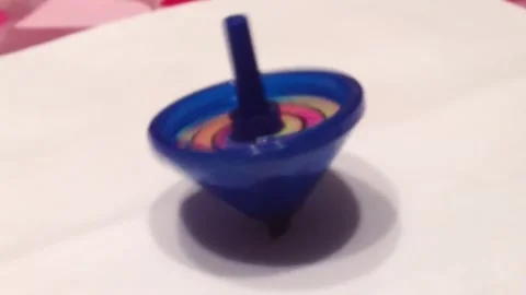 Spinning Draw Top Close-Up Stock Footage 245118615