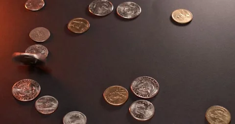 Spinning Eisenhower Dollar coin between US Dollar coins Stock Footage 172116784