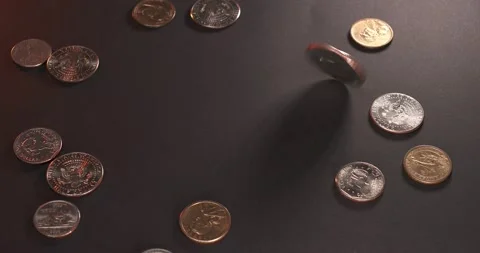 Spinning Eisenhower Dollar next to Half Dollar, quarter and dimes. Stock Footage 172116638