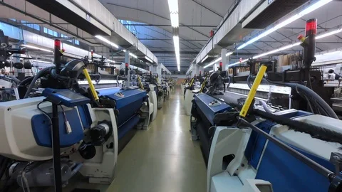 Spinning factory, production of fabrics, thread of silk, view of tunnels of Stock Footage 99908321