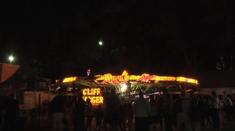 Spinning fair ground ride time lapse at night, full cycle of ride. Stock Footage 27637216