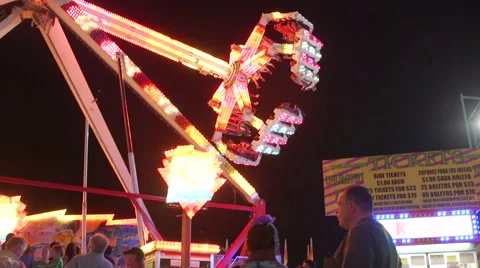Spinning Fair Ride at Night Stock Footage 52263643