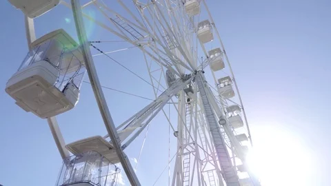 Spinning Ferris wheel Stock Footage 74853172