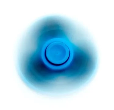 Spinning a fidget spinner Stock Photos