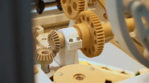 Spinning gears made of plastic Stock Footage 129893890