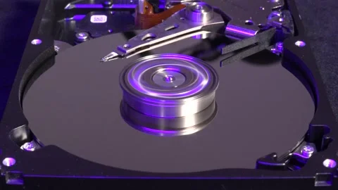 Spinning hard drive, close-up view, with light effects - startup and shutdow Stock Footage 320837106