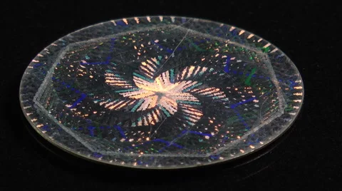 Spinning holographic disk hand Stock-Footage 6040230