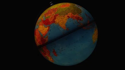 Spinning Illuminated Globe on Black Background Stock Footage 337448957