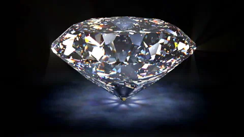 Spinning large diamond with reflection set against black background Stock Footage 231487846