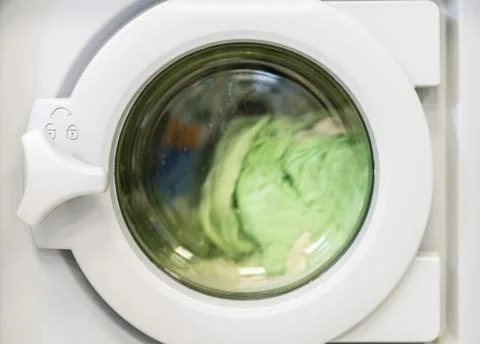 Spinning laundry washing machine. High quality and resolution beautiful pho.. Stock Photos