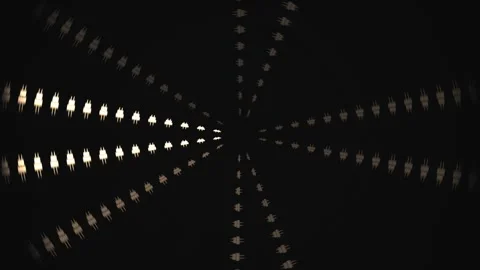 Spinning light pattern creates dynamic motion in dark space Stock Footage 339372751