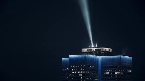 Spinning Lights on top of High Tower Downtown Montreal at Night Stock Footage 142767318