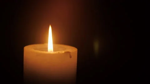 Spinning Lit Candle Stock-Footage 169693008