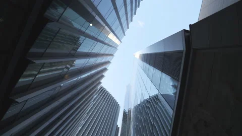 A spinning low angle view of high raise buildings.  Stock Footage 150925150