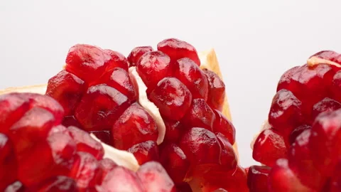 Spinning Macro Pomegranate Seeds (Arils) 360 Loop Isolated on White Stock Footage 319960640