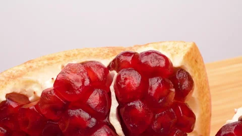 Spinning Macro Pomegranate Seeds (Arils) 360 Loop Isolated on White Stock Footage 319960888