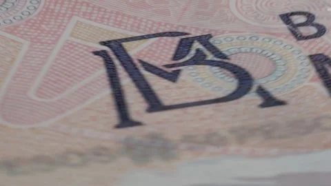 Spinning Macro View of Banknote Security Features and Printed Currency Details Stock Footage 340807518