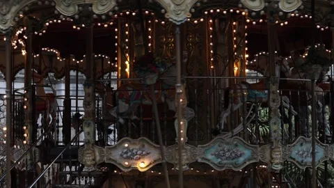 Spinning merry go round carousel amusement park attraction, medium shot. Stock Footage 328716873