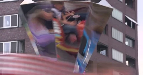 Spinning mirror reflecting a funfair attraction Stock Footage 72917461