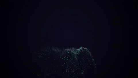 Spinning motion of blue dust splashes on the black background. Stock Footage 131158229