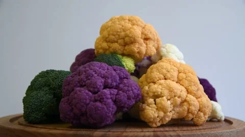 Spinning multi colored cauliflowers Stock Footage 224364941
