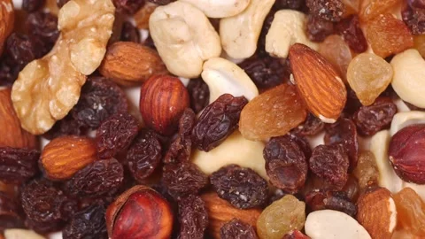 Spinning nuts. close-up of nut mixture slow motion Stock Footage 167797544