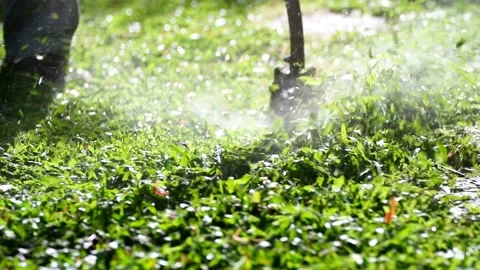 Spinning nylon string parallel to the grass-level slow-motion clip 스톡 동영상 205202877