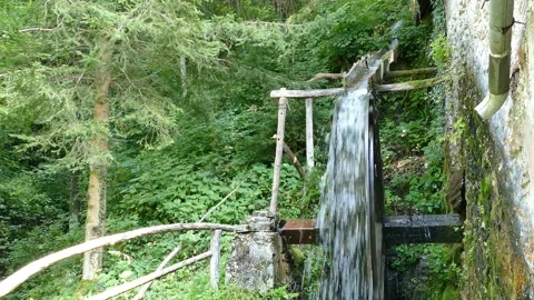 Spinning Old Mill Wheel, front view Stock Footage 144974684
