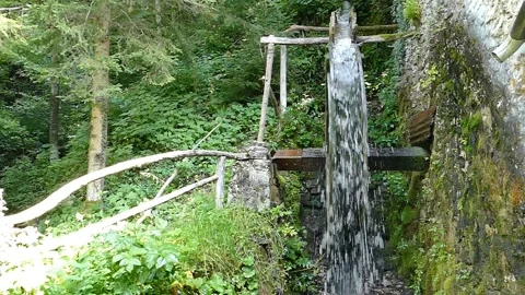 Spinning Old Mill Wheel, front view, slow motion Video stock 144976552