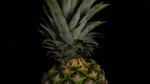 Spinning or rotating the whole pineapple Stock Footage 155690189