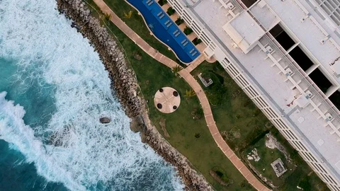 Spinning Overhead View, Sidewalk at Cancun Resort, Mexico Gulf Ocean waving, HD Video stock 94399147