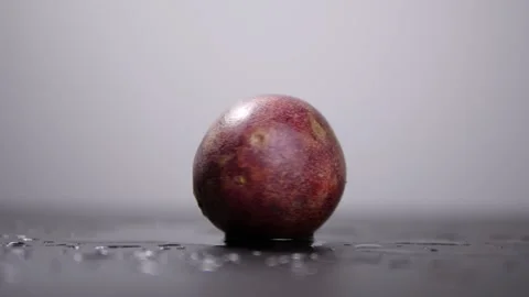 Spinning passion fruit in slow motion Stock Footage 142774698